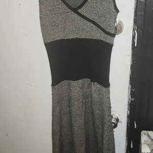 Neck  sweater dress is by moda